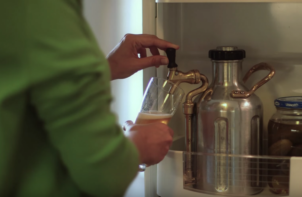 Pouring a beer from a fridge using a uKeg